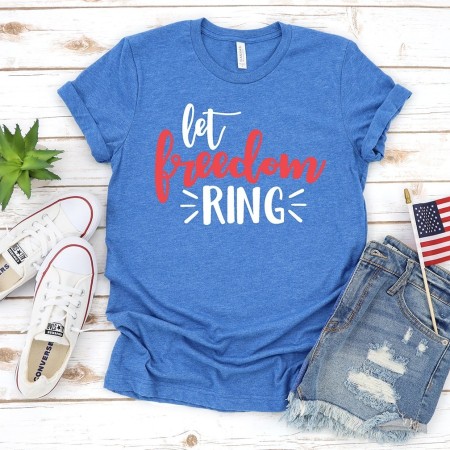 A succulent, tennis shoes, blue jeans shorts, and a blue t-shirt with the saying, "Let Freedom Ring"