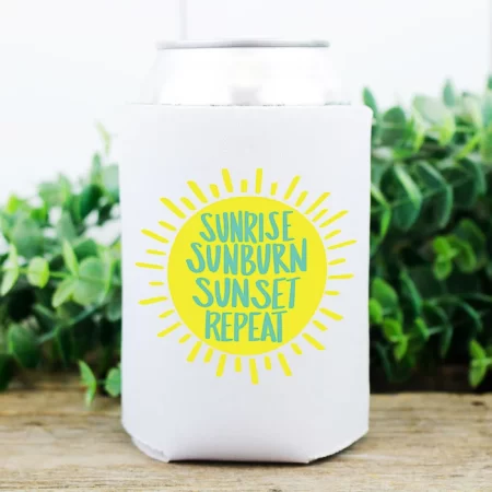 A white koozie decorated with an image of the sun and the words Sunrise, Sunburn, Sunset, Repeat