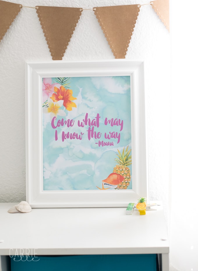 A white framed printable with a saying from Moana that says, \"Come What May I Know the Way\"