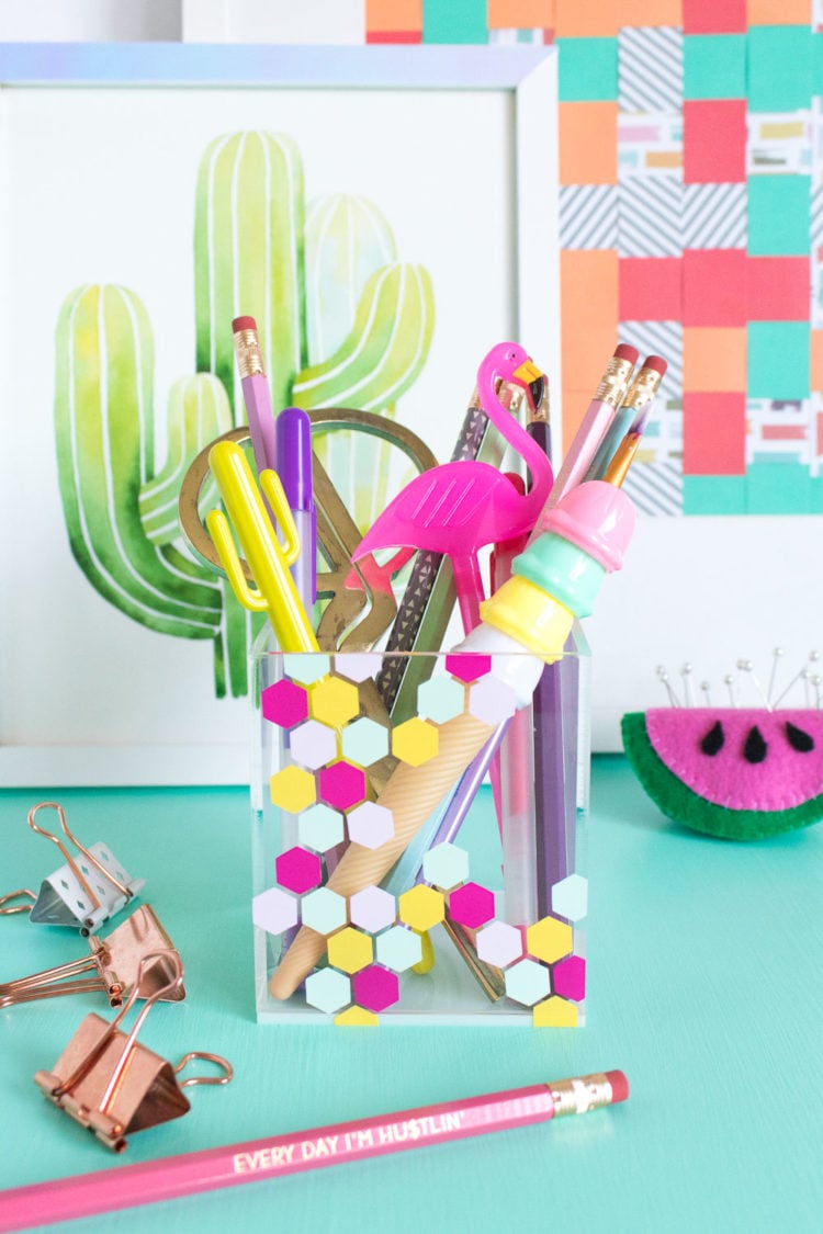 Give your pens and desk goodies a cute little home! Clubcrafted.com shows you how to make this colorful honeycomb acrylic organizer.