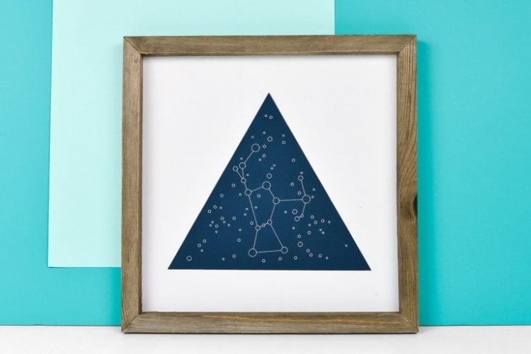 Framed celestial artwork made with a Cricut