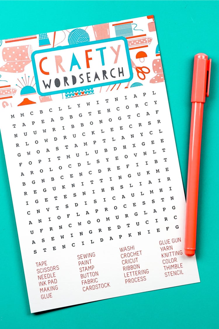 Close-up image of a Crafty Word Search and an orange pen
