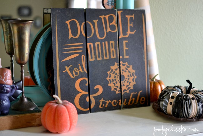 Get crafty and make your very own Toil & Trouble Mini Pallet Halloween Sign from poofycheeks.com. 