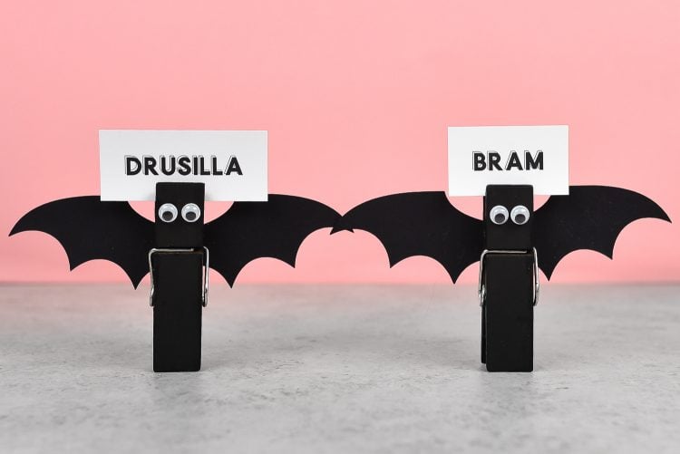 Black bat nametags made from close pins, cut out wings and googly eyes personalized with the name, Drusilla and one with Bram