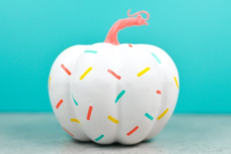 White pumpkin with colorful sprinkles