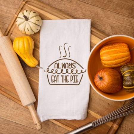 Kitchen towel with wording that says Always Eat the Pie