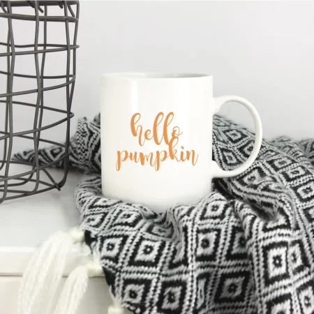 White coffee mug that says Hello Pumpkin