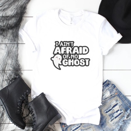 I Ain't Afraid of No Ghose on white t-shirt with halloween decorations