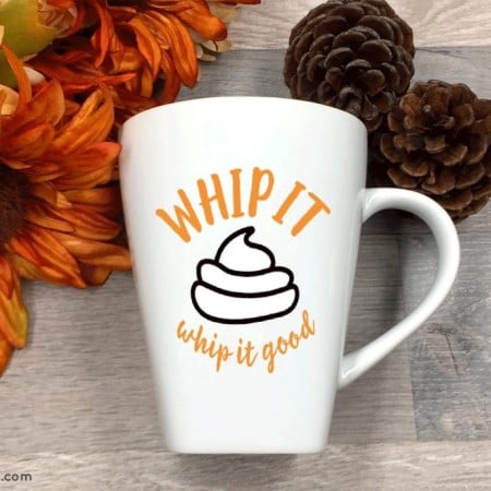 Large coffee mug with an image of whipped cream on it and the words Whip It Whip It Good
