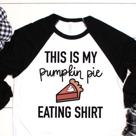 White and black baseball style shirt with the words This is my Pumpkin Pie Eating Shirt on it