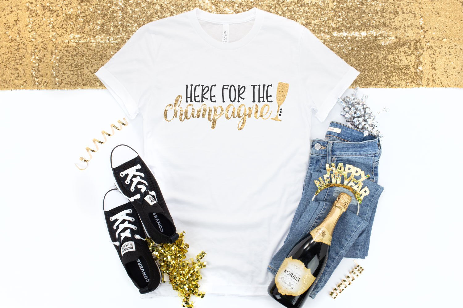 Here for the Champagne SVG on white shirt with NYE props