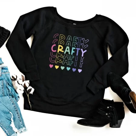 Black long sleeved shirt with an SVG design that says Crafty in rainbow colors