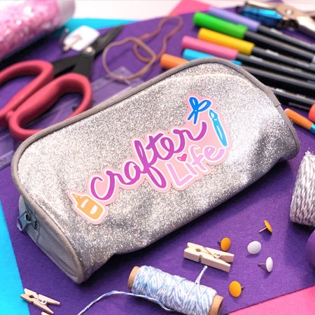 Silver glittery pencil pouch with a SVG design that says Crafter Life