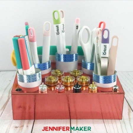 A tool holder organizer filled with Cricut tools