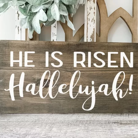 Wooden sign with saying He Is Risen Hallelujah!