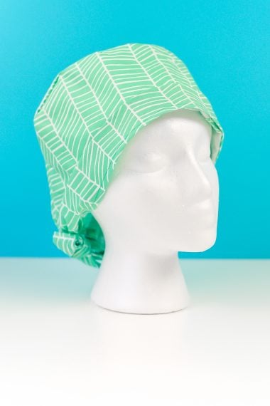 Image of a mannequin head wearing scrub cap designed for health care workers