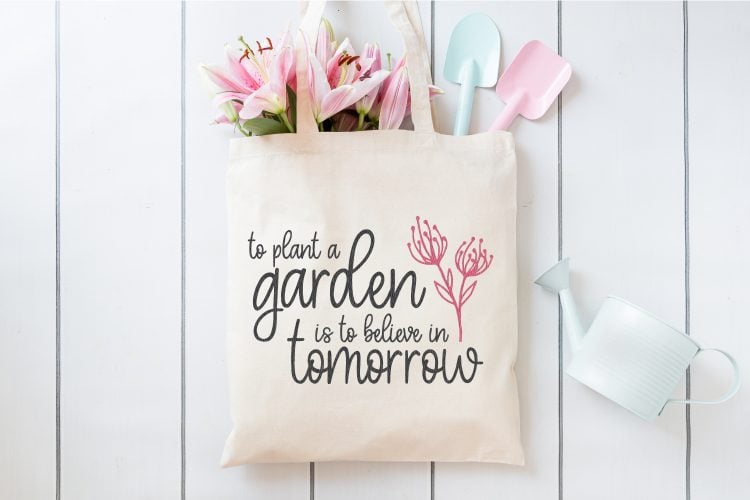 To Plant a Garden SVG on a gardening tote