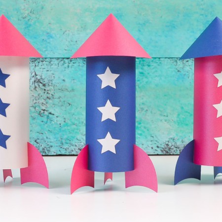 Decorate for the 4th of July on a budget with these paper rockets! These paper rockets can be cut on your Cricut or other cutting machine and assembled in minutes. Plus, get a free SVG template!