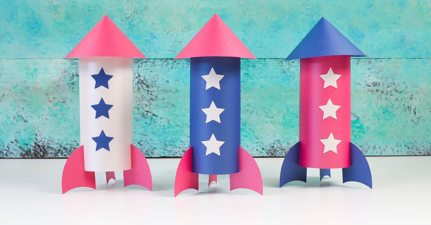 Decorate for the 4th of July on a budget with these paper rockets! These paper rockets can be cut on your Cricut or other cutting machine and assembled in minutes. Plus, get a free SVG template!