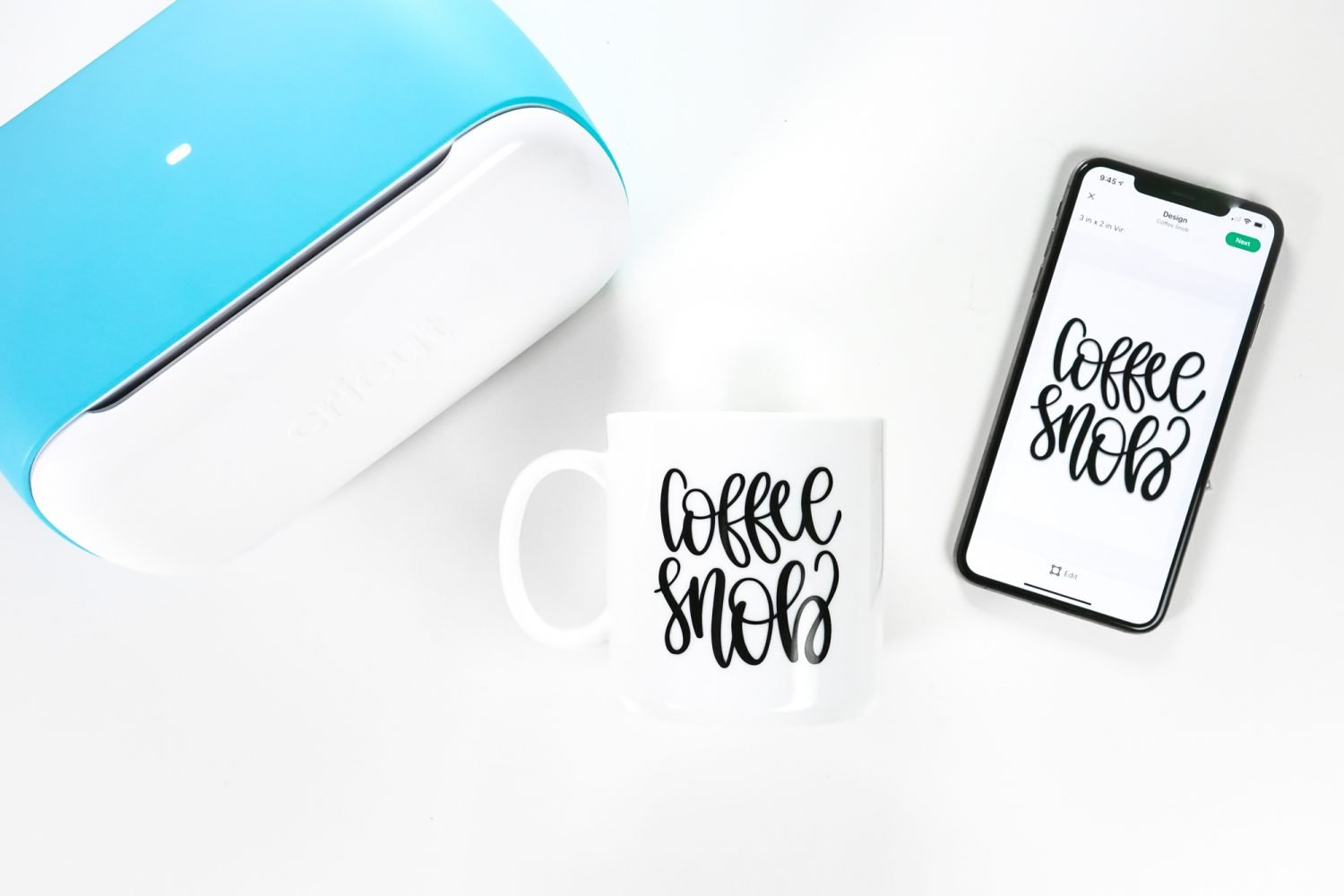 Cricut Joy with iPhone and Cricut Joy app with finished mug project