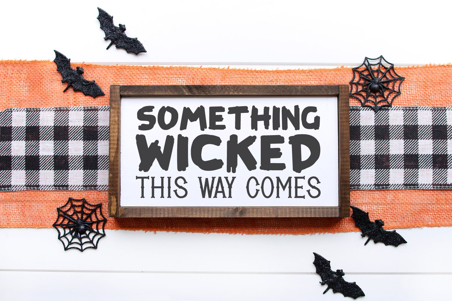 Sign using fonts from this post that reads: Something Wicked This Way Comes 