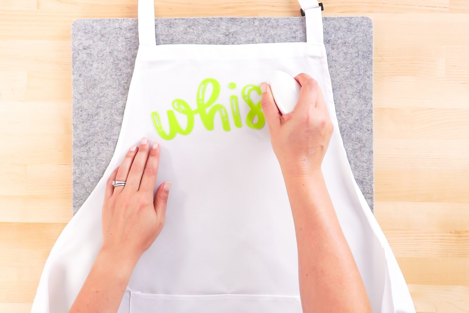 Iron the first layer onto your apron using the EasyPress Mini.