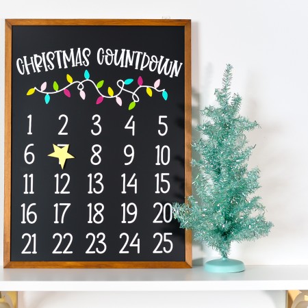 Mark the days until December 25 with this DIY Christmas countdown calendar! Use your Cricut Explore or Maker to craft this cute magnetic advent calendar!