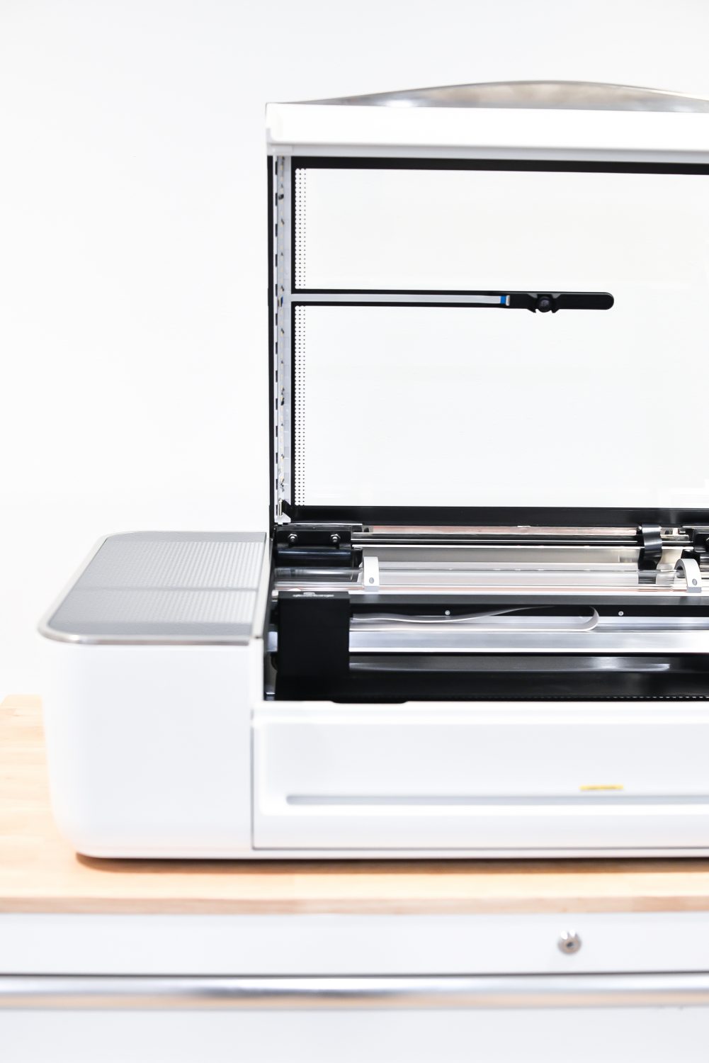 Open glowforge sitting on a table