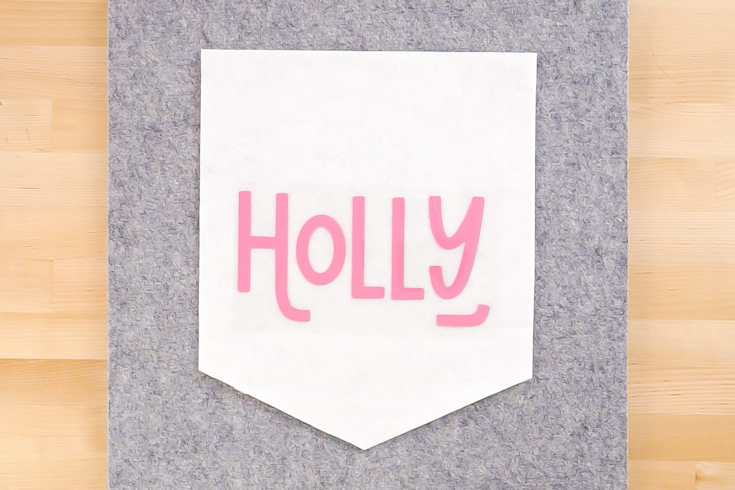 "Holly" decal alone on felt Christmas banner