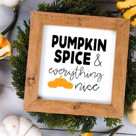 Framed white sign with image of pumpkins and the words, Pumpkin Spice & Everything Nice