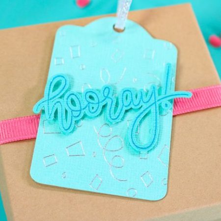 Gift card with the word Hooray on it in a single line foil transfer design