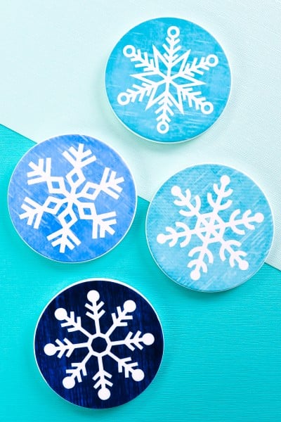 Close up of four snowflake infusible ink coasters