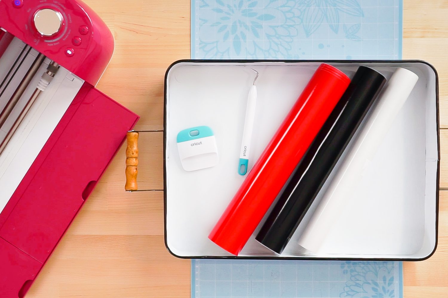 Supplies for this Santa tray: Cricut, 12 x 24 Cricut mat, metal tray, red and black vinyl, transfer tape, scraper, and weeding tool