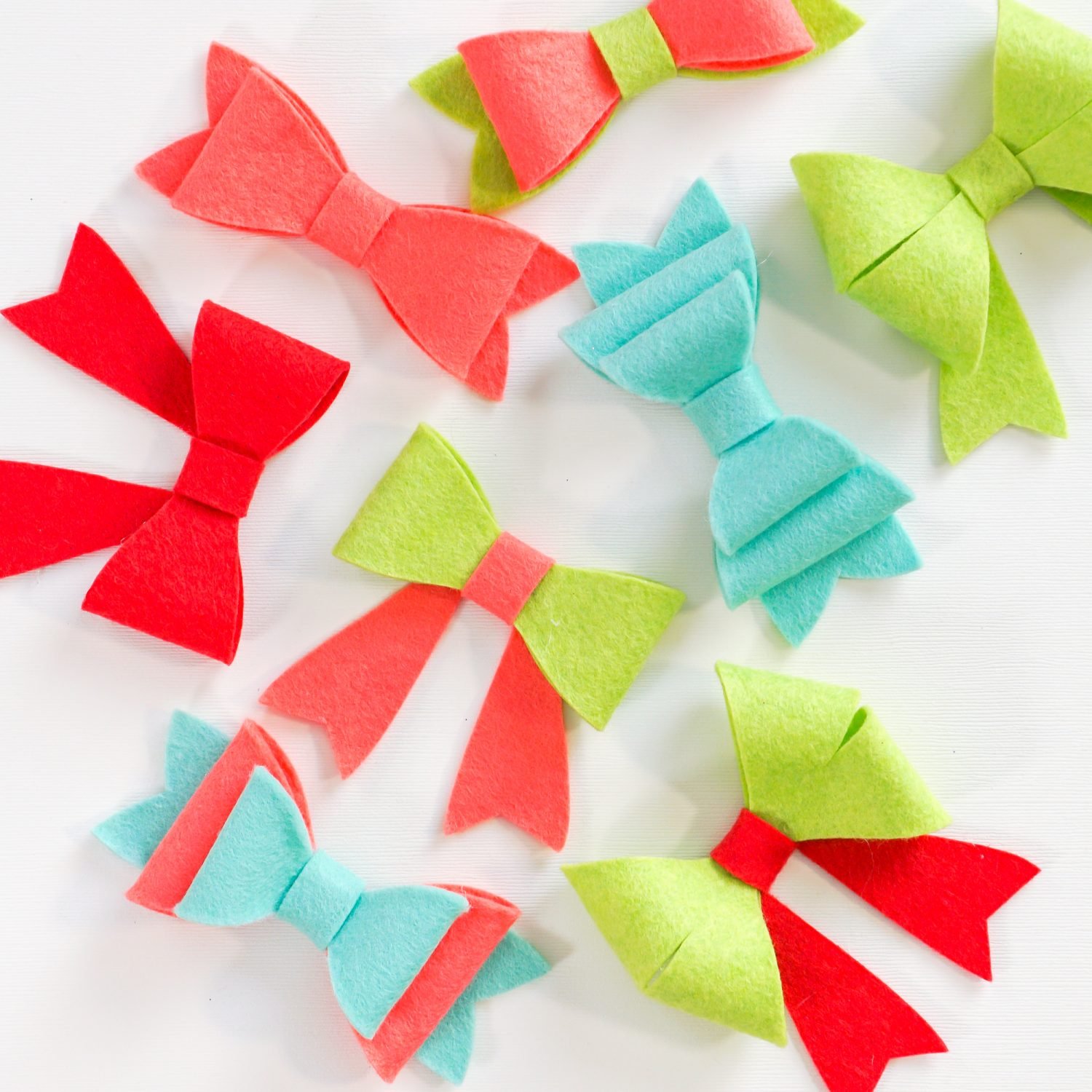 Assembled felt bows in holiday colors of red, green and aqua