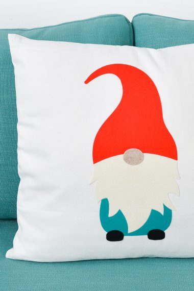 A close up of the felt gnome pillow