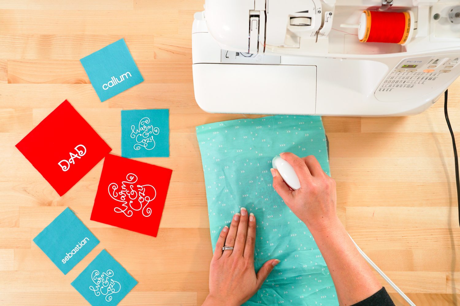 Reversed hand warmer being ironed with EasyPress Mini