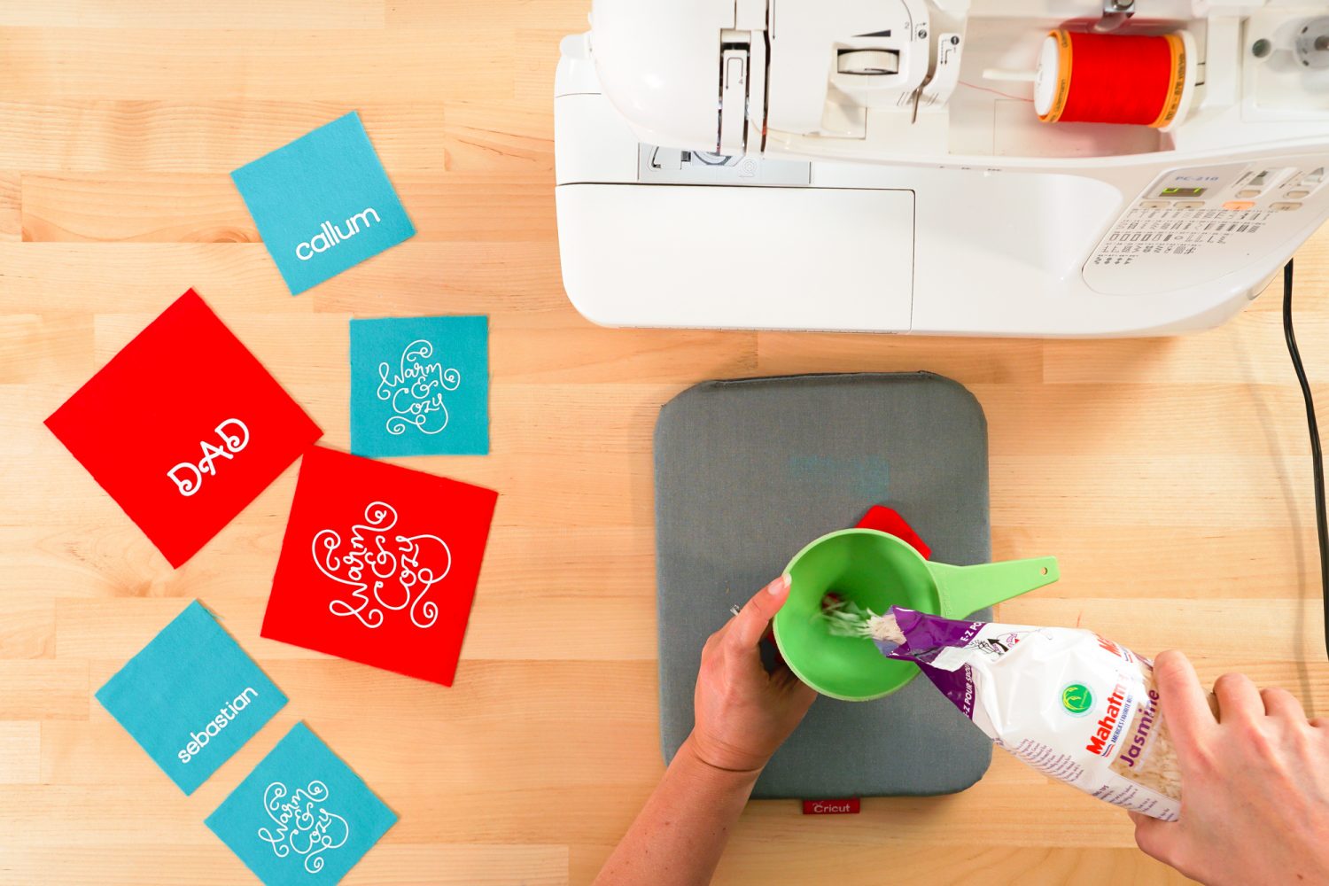 Hands using funnel to fill the DIY handwarmer