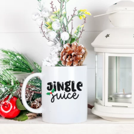White coffee mug that says Jingle Juice on it