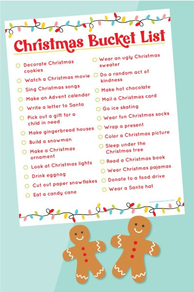 Christmas bucket list on blue background with gingerbread man.