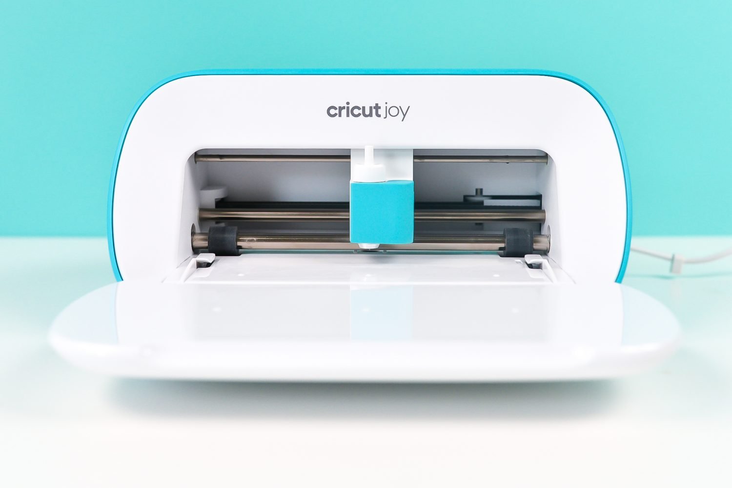 So you got yourself a Cricut Maker, Explore, or Joy...now what? Here's what you'll find in the Cricut box, plus how to set it up, get it turned on, and connect it to your device!