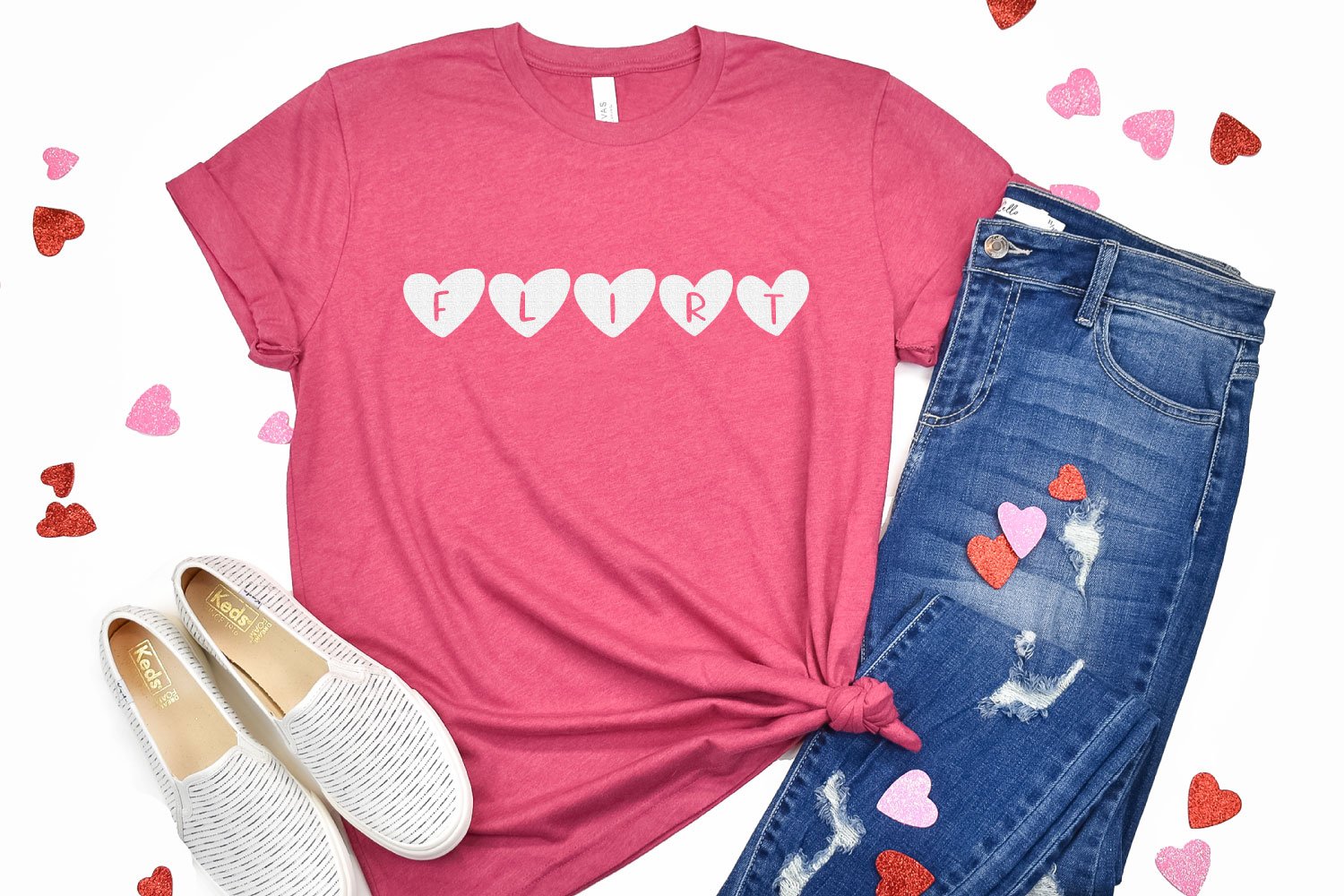 Pink shirt with "flirt" in heart letters