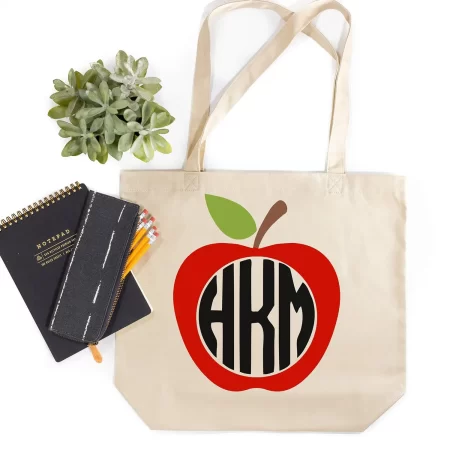 Tote with an apple monogram on it