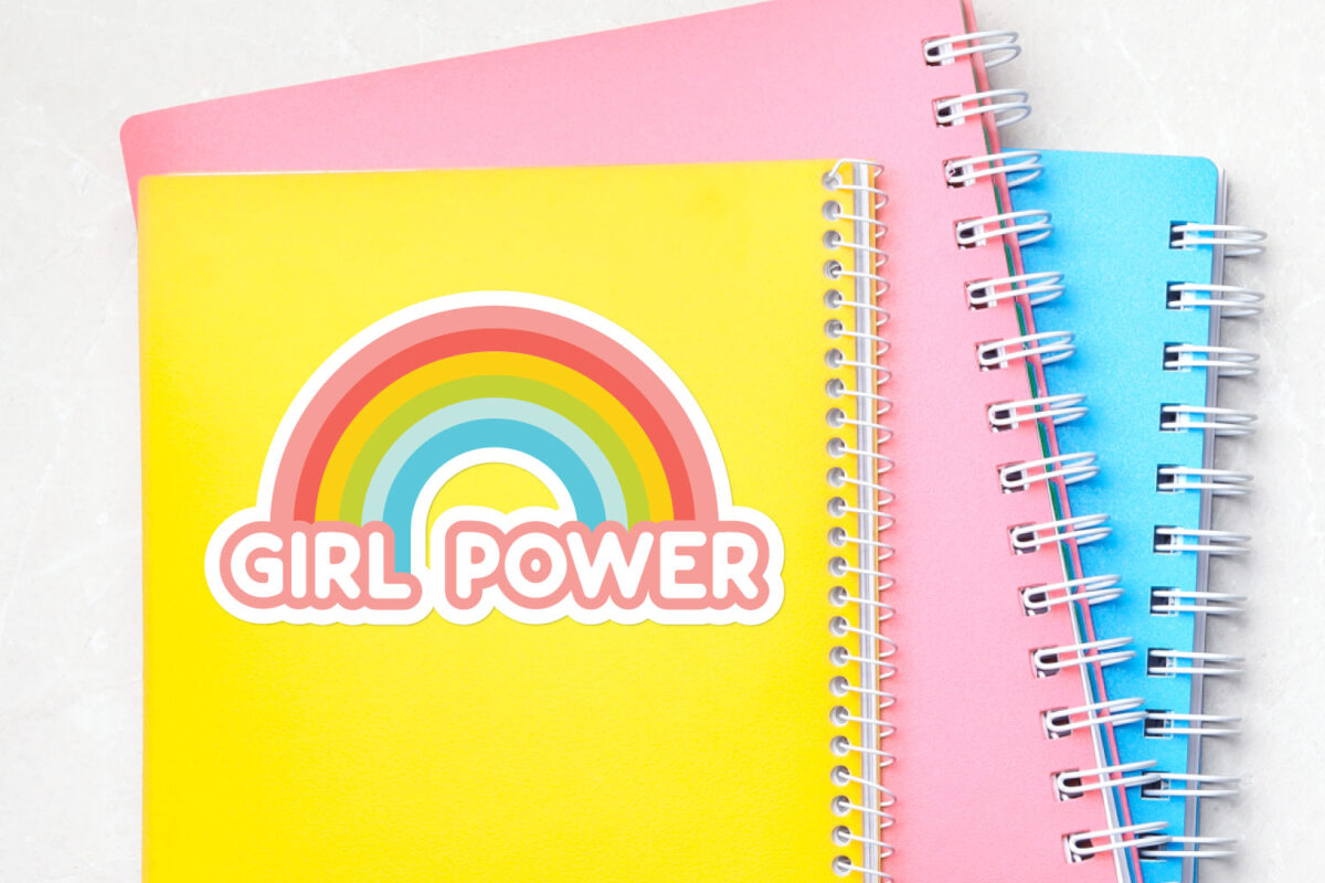 Girl Power sticker on yellow notebook