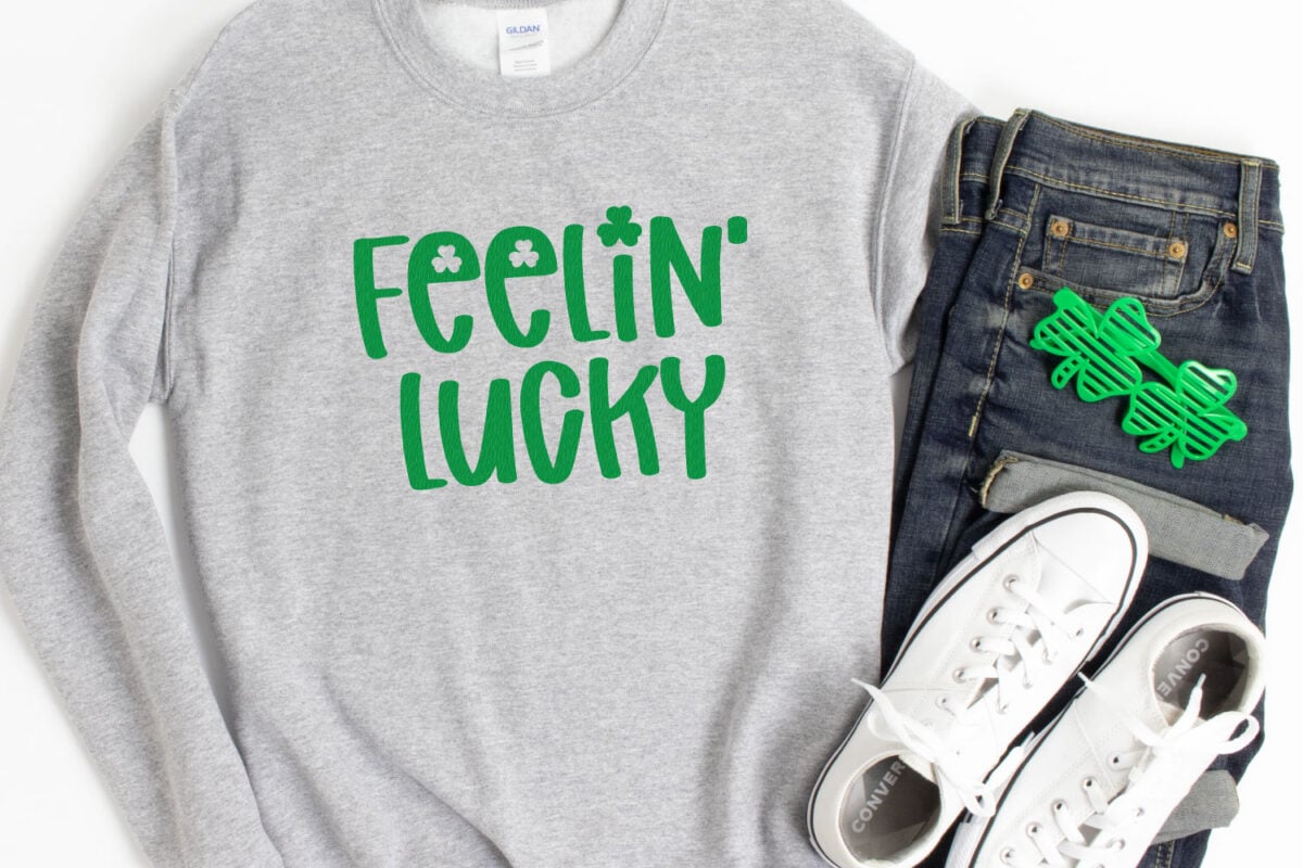 Gray Sweatshirt with "Feeling Lucky" on it