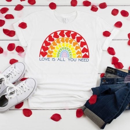 White t-shirt with Heart Rainbow and the words Love is All You Need