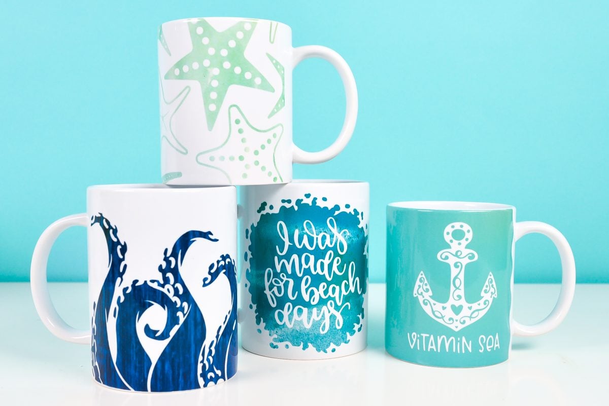 Four sea-themed mugs