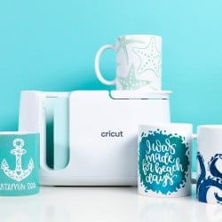 Cricut Mug Press with four sea-themed mugs