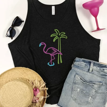 An image of a neon flamingo and palm tree on a black tank top