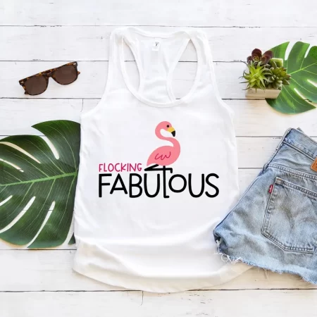White tank top with an image of a pink flamingo and the saying Flocking Fabulous