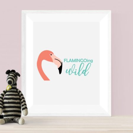 White framed picture of the head of a flamingo and the saying Flamingoing Wild